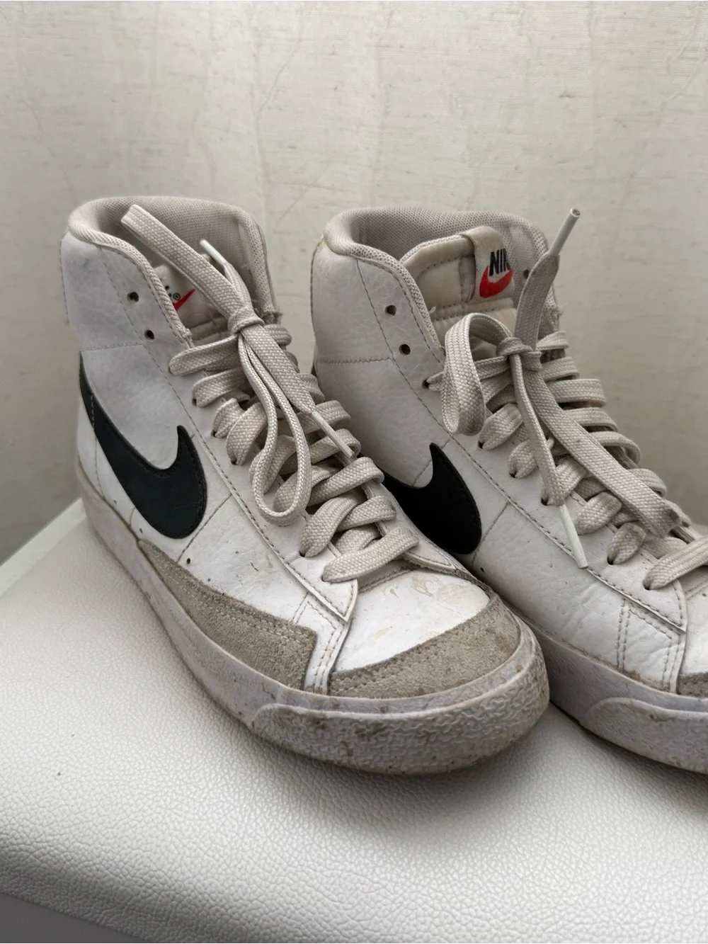 Nike Men’s White High-Top Sneakers with Black Swoosh and Red Tongue Logo